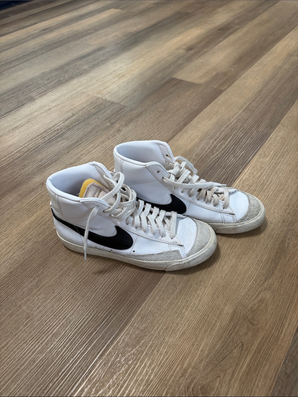 Nike Kids White High-Top Sneakers with Black Swoosh and Yellow Tongue Detail